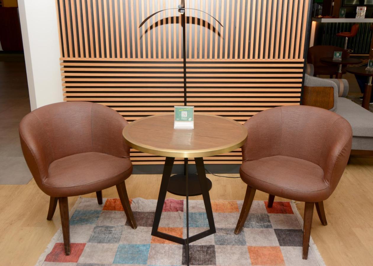Holiday Inn Istanbul City By Ihg Exterior photo A pair of chairs and a table